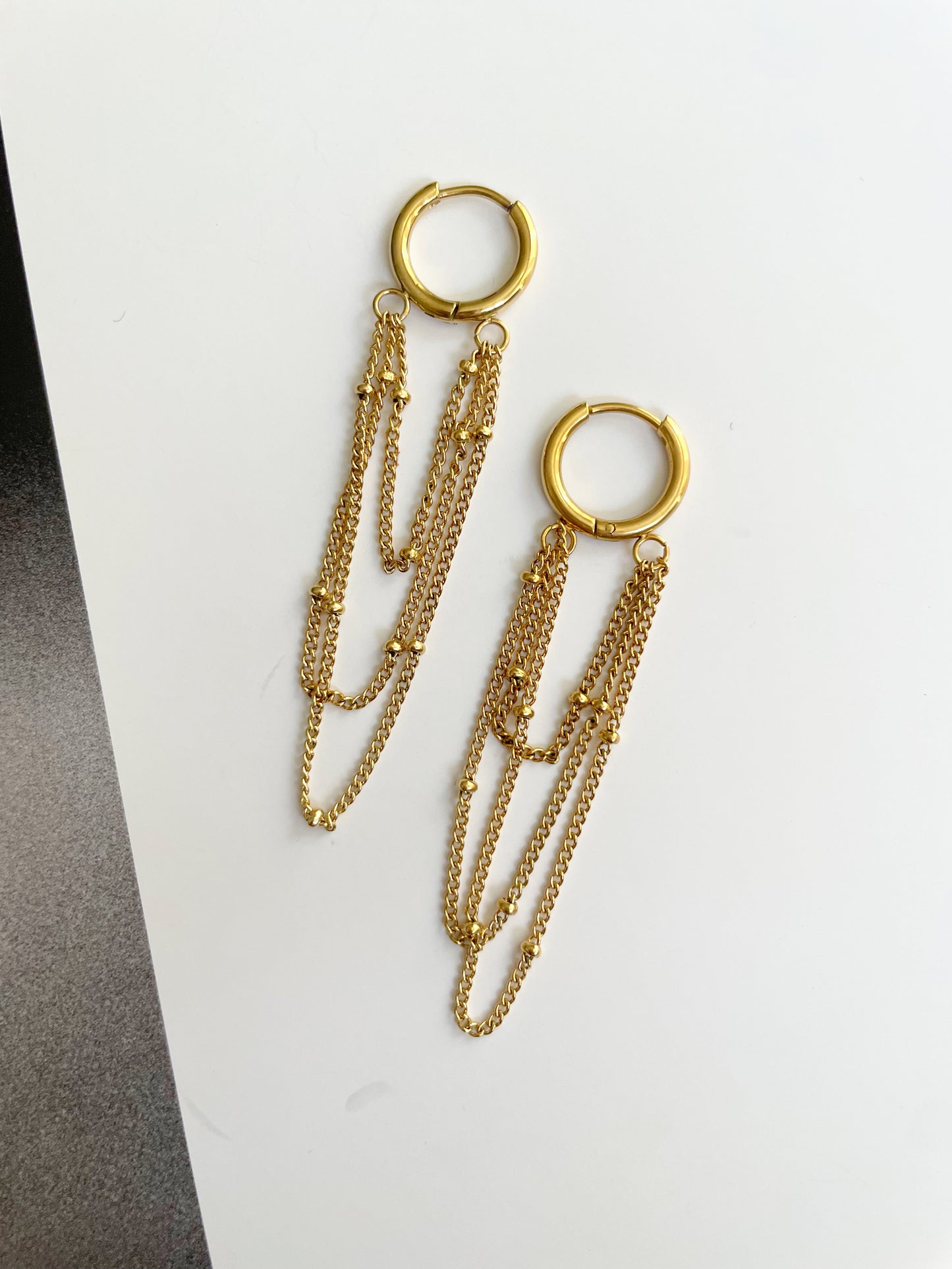 Chained hoops earrings