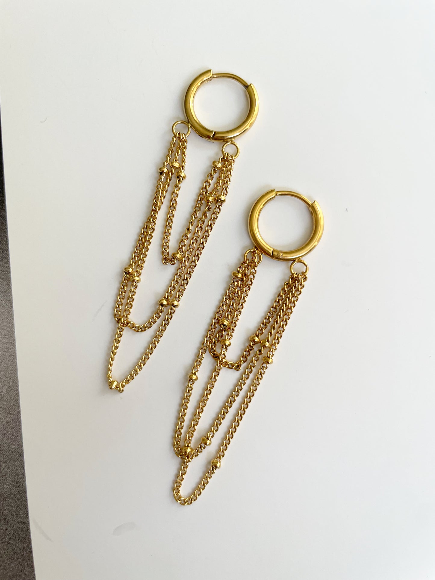 Chained hoops earrings