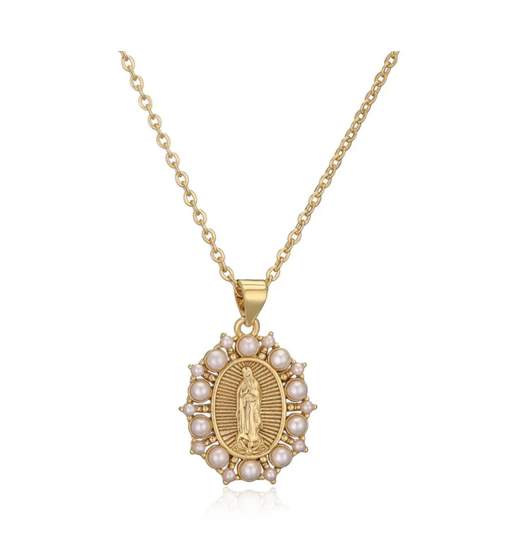Religious gold and pearls medal